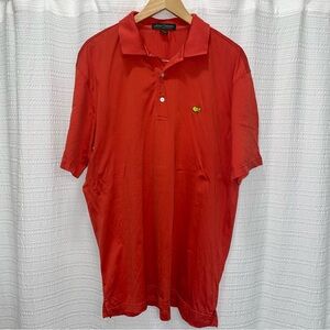 Red/orange Master’s polo